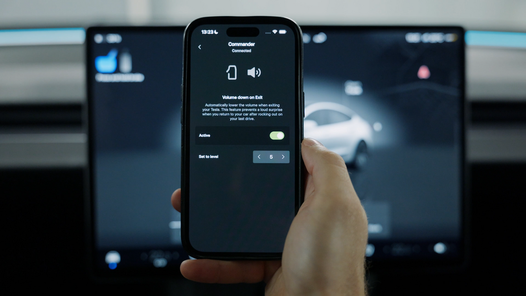 Automatically lower the volume of your Tesla on exit